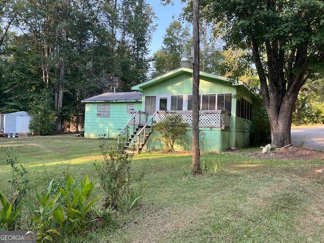 Being sold AS-IS. This 3 bedroom 2 bath home with a sunroom addition is located in the desirable Crooked Creek area. This property has the perfect mix of privacy and convenience, it is tucked away on a 1.56 acre lot with the community boat ramp next door where you can launch your boat and be on the lake in no time or you can just sit on your dock and enjoy the views. Conveniently located between Milledgeville and Eatonton with easy access to the Lake Oconee area. Whether you are looking for full-time living, a weekend getaway or an investment opportunity with a few cosmetic upgrades you can make your dream of owning a Lake Home a reality! Call to schedule your visit today!