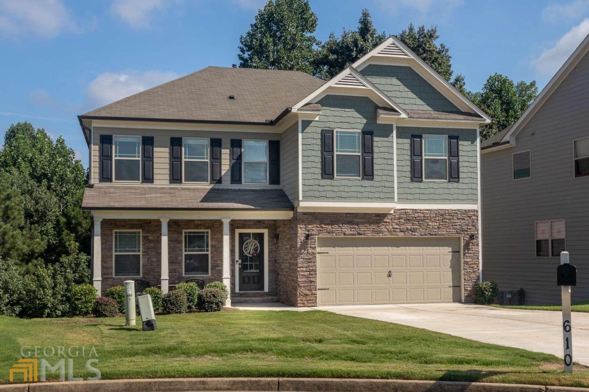 Fabulous 5 BR/3 bath near the new Holly Springs downtown development. Culdesac lot that backs to a wooded buffer area built in 2020. Beautiful large kitchen with upgraded granite. Hardwoods on main.. Basement with 3 sided windows, stubbed for bath and ready to finish! Oversized primary suite with tray ceilings, office area and large walk in closet with daylight window and granite counter top in bathroom. 5th bedroom has 2 closets and oversized - ready for bonus room or playroom.