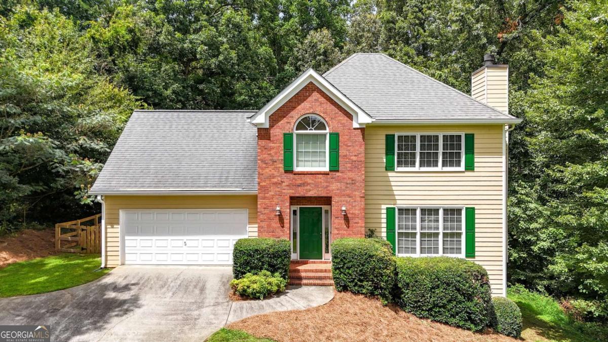Welcome to 1005 Springharbor Walk - the perfect blend of comfort, convenience, and community. Nestled in the peaceful Springfield Place neighborhood, this home offers functional, spacious living with access to top-rated schools including Johnston Elementary, Mill Creek Middle, and River Ridge High. Enjoy the cozy fireplace, and seamless flow to the outdoors. Step into your backyard and enjoy the sights of deer, birds, and other wildlife right from your patio. The quiet cul-de-sac lot, surrounded by mature landscaping, provides privacy and a serene setting for everyday living. An unfinished basement offers endless potential. All it needs is your customized touches to truly make it your own. As part of a swim/tennis community, you'll have access to a neighborhood pool, tennis courts, and a friendly, active atmosphere. Enjoy a convenient commute via I-575, with shopping, dining, grocery, and medical facilities just minutes away. This one won't last long-schedule your showing today and make this Springfield Place gem your new home.