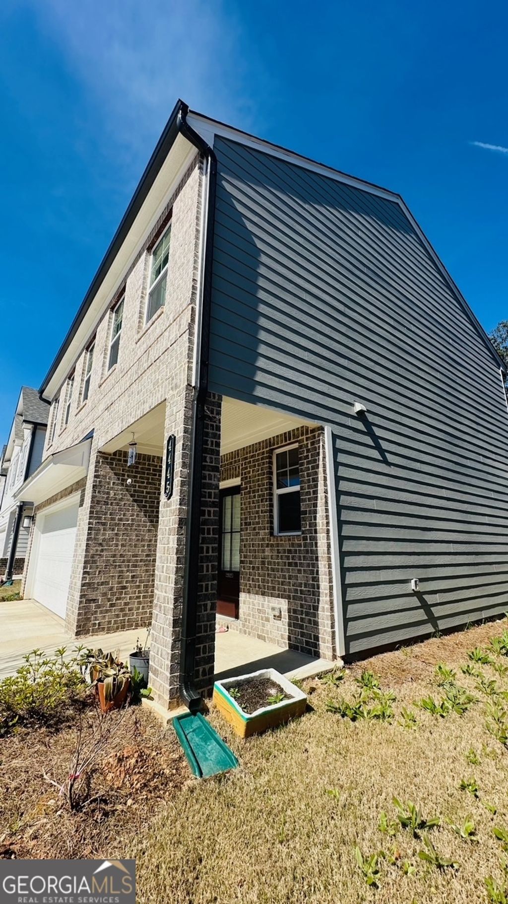 Photo of 4445 Buttonwood Lane, Lilburn, GA 30047 (MLS # 10715494)