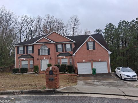 Photo of 751 Trigg Lake Court, Stone Mountain, GA 30087 (MLS # 10631985)