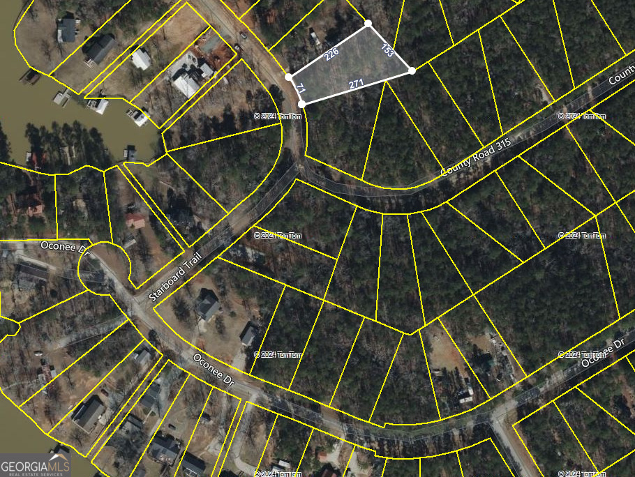 Take advantage of this amazing opportunity to build your dream home in Lake Sinclair! This half-acre, level lot is perfect for those seeking privacy and tranquility with potential lake views. Imagine waking up to serene surroundings every day! While it doesn't have direct lake access, a super convenient boat ramp nearby ensures you're never far from water adventures. Plus with paved roads, accessing your future lakeside paradise is a breeze. Don't let this incredible chance slip away-make it yours now!