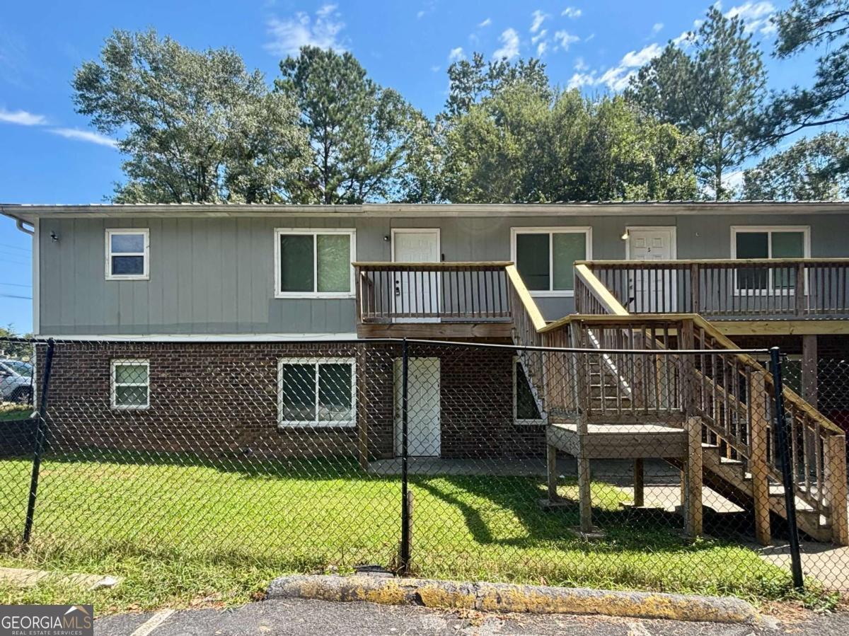 Welcome to your new home! This bright and spacious 2-bedroom, 1-bath upper-level corner unit is located in a quiet multi-unit complex just minutes from downtown Austell. Features Include: All Luxury Vinyl Plank (LVP) flooring throughout - no carpet! Freshly painted kitchen cabinets for a clean, updated look, Includes refrigerator and electric range. Upper-level corner unit provides added privacy and natural light Convenient to shopping, restaurants, and local businesses, close to a park, playground, and public transit options. Well-lit neighborhood with street lights for added safety. WE NEVER ADVERTISE ON CRAIGSLIST