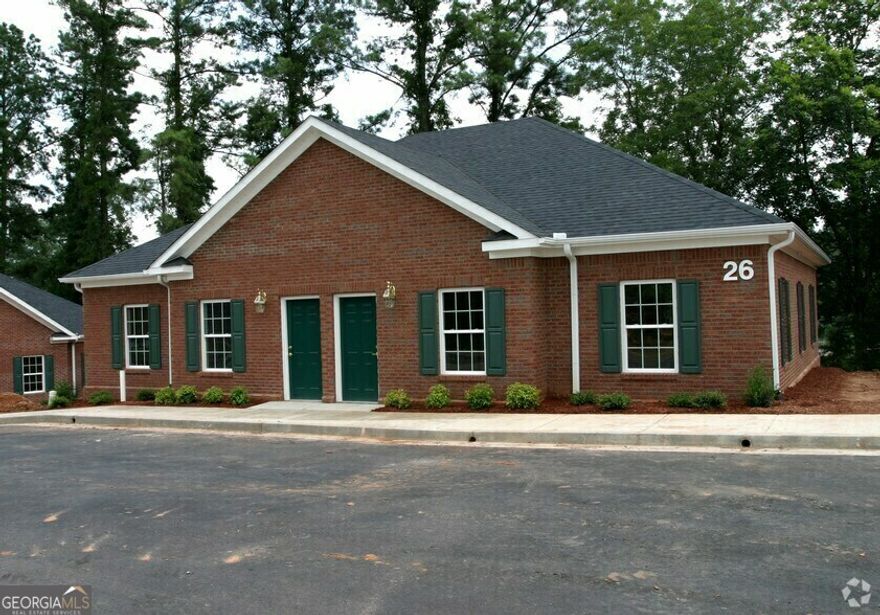 Located in the highly desirable Sandy Plains Executive Office Park, directly across from Sprayberry High School and near East Piedmont Road, this office offers exceptional accessibility and convenience. The suite is ADA accessible and situated in a one-story building at the rear of the office park, ensuring privacy and ease of access. The office is approximately 1,068 square feet and features a reception/waiting area, 4 offices, a bathroom, and a spacious breakroom/kitchen area. With a prime location and ample parking, this office is perfect for businesses looking to establish or expand their presence in a thriving area.