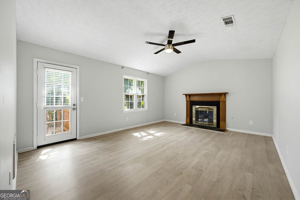 Photo of 1220 Grayland Hills Trail, Lawrenceville, GA 30046 (MLS # 10875189)