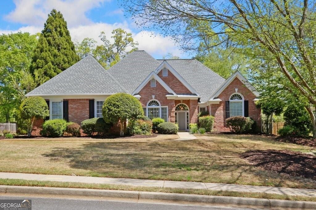 Photo of 4009 Treemont Lane, Suwanee, GA 30024 (MLS # 10819903)