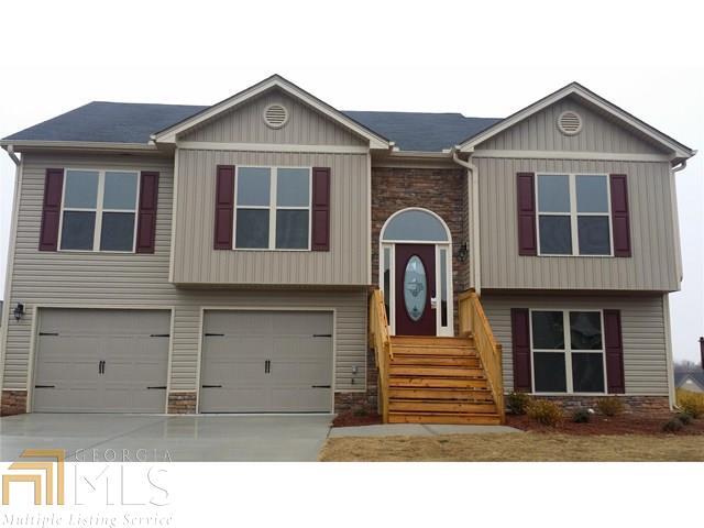 Craftsman style split foyer, 4 bedroom, 3 bath, granite kitchen countertops w/ stained cabinets on main level, separate kitchenette in lower level, large greatroom on main level w/ stacked stone fireplace, separate living room in lower level, master bedroom w/ trey ceilings, master bath has garden tub and separate shower, walk in closets, lower level has office/study, patio, large deck, 2 car garage, wooded culdesac lot, warranty, home qualifies for 100% USDA Financing, seller will contribute up to $4000 towards closing cost w/ use of preferred lender only. Photos are of home plan being constructed, not of actual subject property "Dawson Plan"