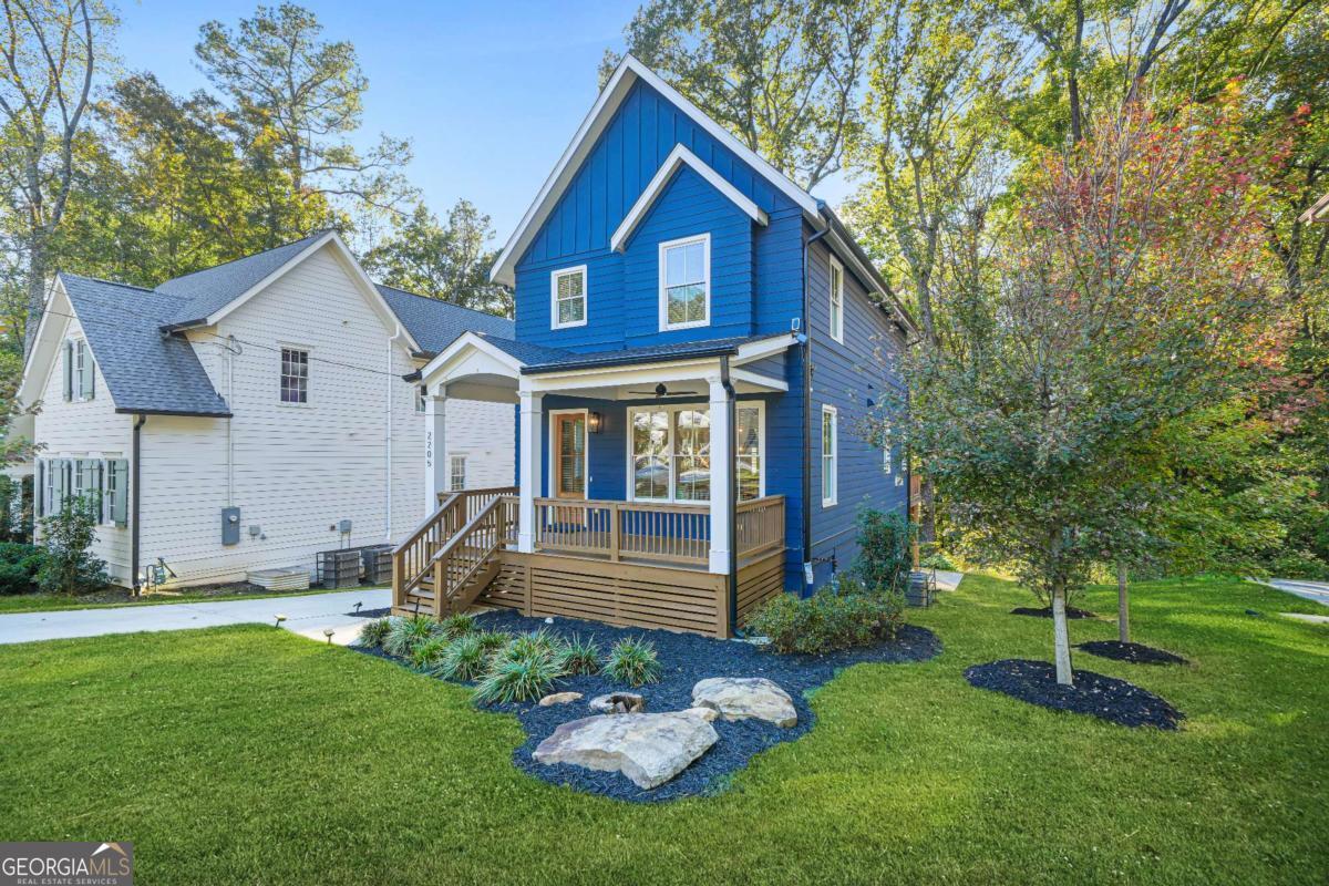 SELLER TO PROVIDE A 2-1 RATE BUYDOWN! RATES IN THE 4'S FOR FIRST YEAR AND 5'S FOR THE SECOND! Simply stunning Modern Farmhouse featuring 3 bedrooms PLUS office, 2.5 bathrooms, unfinished basement room, built in mud room area and a rare two car drive under garage! Gorgeous high-end finishes include white oak wide plank hardwood floors, box beam ceiling, built-in window seat with storage, wide cone pendant lighting, floating shelves, ship lap fireplace, barn door pantry, tons of built-in shelving and the list goes on!! Amazing chef's kitchen is fully equipped with large island, stainless steel 5-burner convection range, custom range hood, dishwasher and 4 dr french door refrigerator, slide out cabinet shelving and note cabinets go to the ceiling! Primary suite features vaulted ceilings, walk-in custom closet, marble tile, brushed gold luxury fixtures and oversized shower with separate handheld! Two additional bedrooms, hall bath with storage shelving and laundry closet complete the upstairs. 10ft ceilings on the main, rear floor to ceiling windows and door lets abundance of natural light stream in and opens to oversized back deck that truly is your area of peace and serenity with wooded views and nature sounds, hard to imagine you are living in the city! Plenty of storage, basement room perfect for home gym, 2 car garage with charging station, window blinds throughout, this home has it all! Southtowne Trail access is literally just steps away at end of the street taking you through two miles of the prettiest scenery and the Swann Nature Preserve, South Bend Park and the South River, all this outside your front door! Welcome to Historic Lakewood Heights where access to Atlanta Hartsfield International Airport, Screen Gems Studios, Lakewood Amphitheatre, all interstates and everything Atlanta is just minutes away!