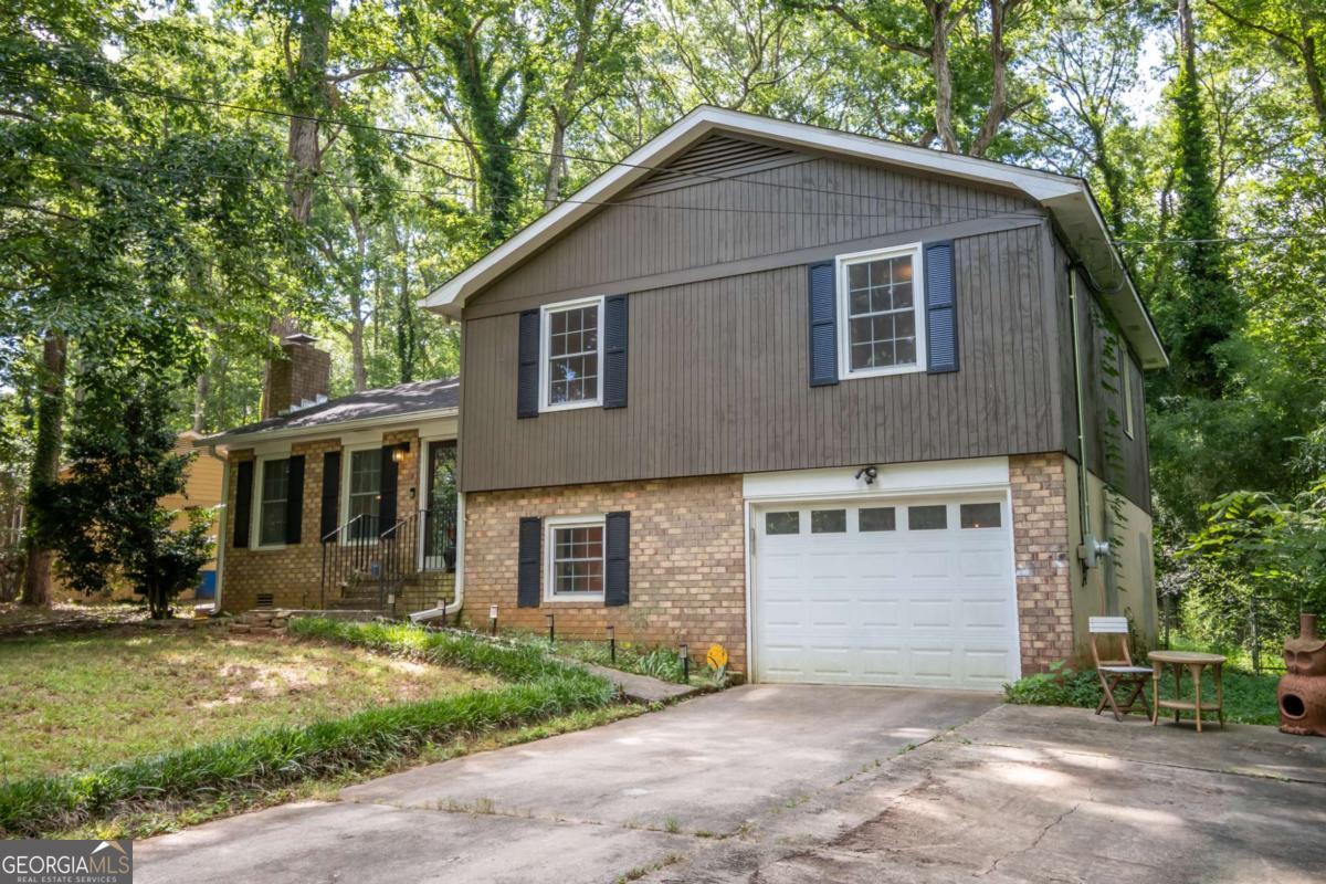 A beautiful 4-bedroom 2-bath split-level home, minutes away from Catepillar, Loop 10, and 316. Just off Atlanta Hwy, this home is convenient to everything in Athens and beyond. The home is nestled on a private .42 acre lot. As you approach the home, you will find ample parking and a single-car garage. Once you enter the home, you will be welcomed by the main floor, which houses the family room, eat-in dining room, and kitchen. The kitchen is an entertainers dream with plenty of counter space, newer stainless steel appliances, a dining room for a table that seats 8 plus comfortably, and a peninsula where all the guests will be able to socialize. As you move upstairs, you will find zero carpet in the home. Upstairs, there are two secondary bedrooms on the front of the home, the rear of the home holds the updated hall bath, and the owners suite also has a remodeled bath. Downstairs, you will find the bonus space that could be used for a second family room, office space, or flex space. This area leads you to the fourth bedroom and the exit to the garage. The garage is deep and spacious with room for a car, work bench, and plenty of storage with the custom cabinetry along the back wall. The backyard has a deck overlooking the fenced-in backyard. The home has updated wiring for an electric car charger. The home is easy to show with some notice and flexible in move-in dates. Call to schedule your showing today.