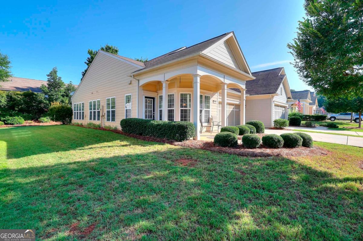 Welcome to this light and bright 2-bedroom, 2-bath Kenwood Model Villa, featuring an inviting sunroom-perfect for relaxing or entertaining. Brand new carpeting has been installed in both bedrooms, while the main living areas boast engineered hardwood flooring for a modern, low-maintenance touch. The eat-in kitchen offers ample cabinetry, a pantry, and all appliances included, making it move-in ready from day one. Del Webb Villas offer true "lock and leave" convenience. The Villa Association HOA handles the roof, gutters, exterior painting, underground sprinklers, and termite protection. Meanwhile, the Del Webb HOA takes care of lawn care and provides access to the community's exceptional amenities-so you can sit back, relax, and fully enjoy the Del Webb lifestyle. This charming Villa is a must-see-schedule your visit today!