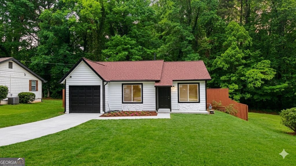 Photo of 733 Inland Way, Lilburn, GA 30047 (MLS # 10754688)