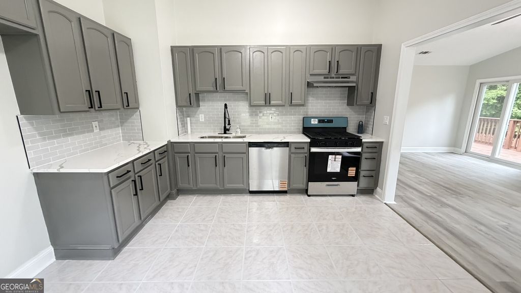 Photo of 733 Inland Way, Lilburn, GA 30047 (MLS # 10754688)