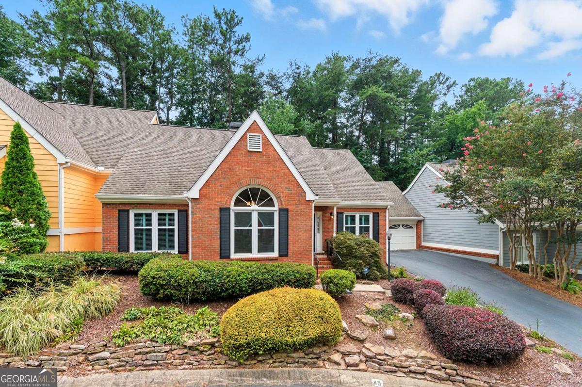 Welcome to 45 Vernon Glen Court, Dunwoody - Where comfort meets convenience in an unbeatable location! This spacious 3-bedroom, 3-bathroom townhome offers over 2,200 sq. ft. of well-designed living space. Enjoy the convenience of a master suite on the main level, complete with an updated walk-in shower and custom-designed kitchen cabinets. With a guest bedroom and another full bath also on the main level, this home truly feels like a retreat. Upstairs, you'll find an additional bedroom and full bathroom, perfect for guests or privacy. The brand-new siding installed by the HOA, skylights, and energy-saving windows provide a modern touch, while the private fenced backyard offers a serene escape. No need to worry about exterior maintenance-the HOA covers it all, including landscaping, water, and trash services. With a 2-car garage and a location just minutes from Perimeter Center, Dunwoody, and Sandy Springs, you're close to vibrant shopping, dining, and entertainment options. Plus, easy access to major highways (400 & 285) makes commuting a breeze. This sought-after floorplan in the Glenridge Court community is perfect for those who value both tranquility and convenience. Don't miss out-schedule your showing today and make this home yours!