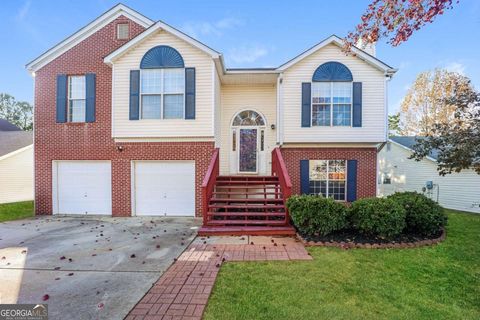 Photo of 5899 Eagles Feather Lane, Riverdale, GA 30274 (MLS # 10653896)