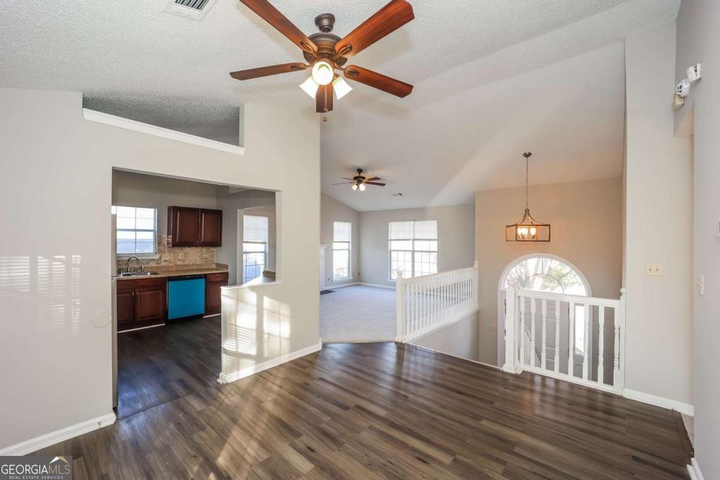 Photo of 5899 Eagles Feather Lane, Riverdale, GA 30274 (MLS # 10653896)