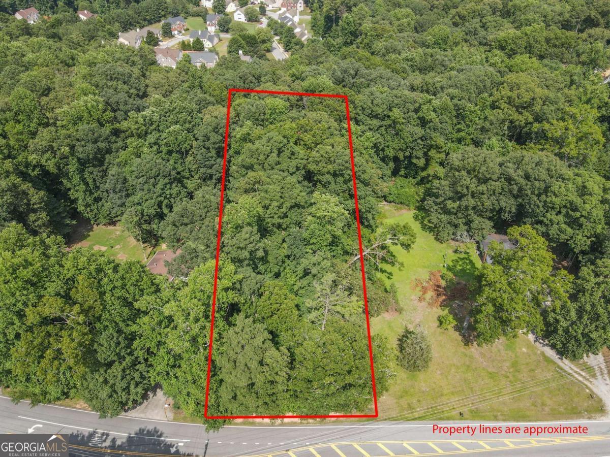 Discover the potential of this stunning 1.1-acre lot, an ideal setting to build your dream home or create a private retreat. Whether you're planning a custom residence or exploring agricultural possibilities, this versatile property offers the freedom to bring your vision to life. The lot has been recently flagged, with clearly marked corners for your convenience. With sewer access already available and a completed soil survey on hand, the path to development is made easier. Surrounded by natural beauty, the expansive space offers plenty of room for a home, gardens, or outdoor living areas, providing both privacy and peacefulness. Enjoy the best of both worlds: a quiet, scenic environment with easy access to major roads and everyday amenities. Don't miss this exceptional opportunity to build in a location that combines rural charm with modern convenience.