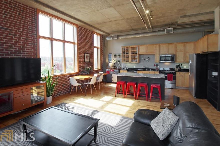 One of a kind 2BR/2BA loft in O4W across from the East Side Beltline trail. New HVAC, New Water Heater, New Remodeled Bathrooms, Newly updated kitchen and more in one of the best constructed buildings in Atlanta. Glen Iris lofts boasts solid point and beam construction with real refinish-able hardwoods, stainless steel appliances including gas cooktop, solid loft/barn doors, custom closets, extra storage, washer/dryer included and more. Walk to Forum Gym across across the street. Walk to Ponce City Market, O4W Park, Whole Foods, Restaurants, Nightlife and much more. Ask about special low down payment options for this building. Bring all offers!