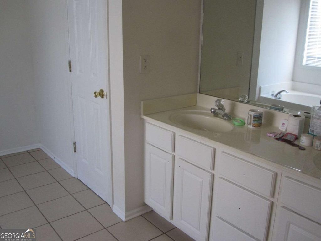 Photo of 442 Mimosa Grove Crossing, Tucker, GA 30084 (MLS # 10687478)