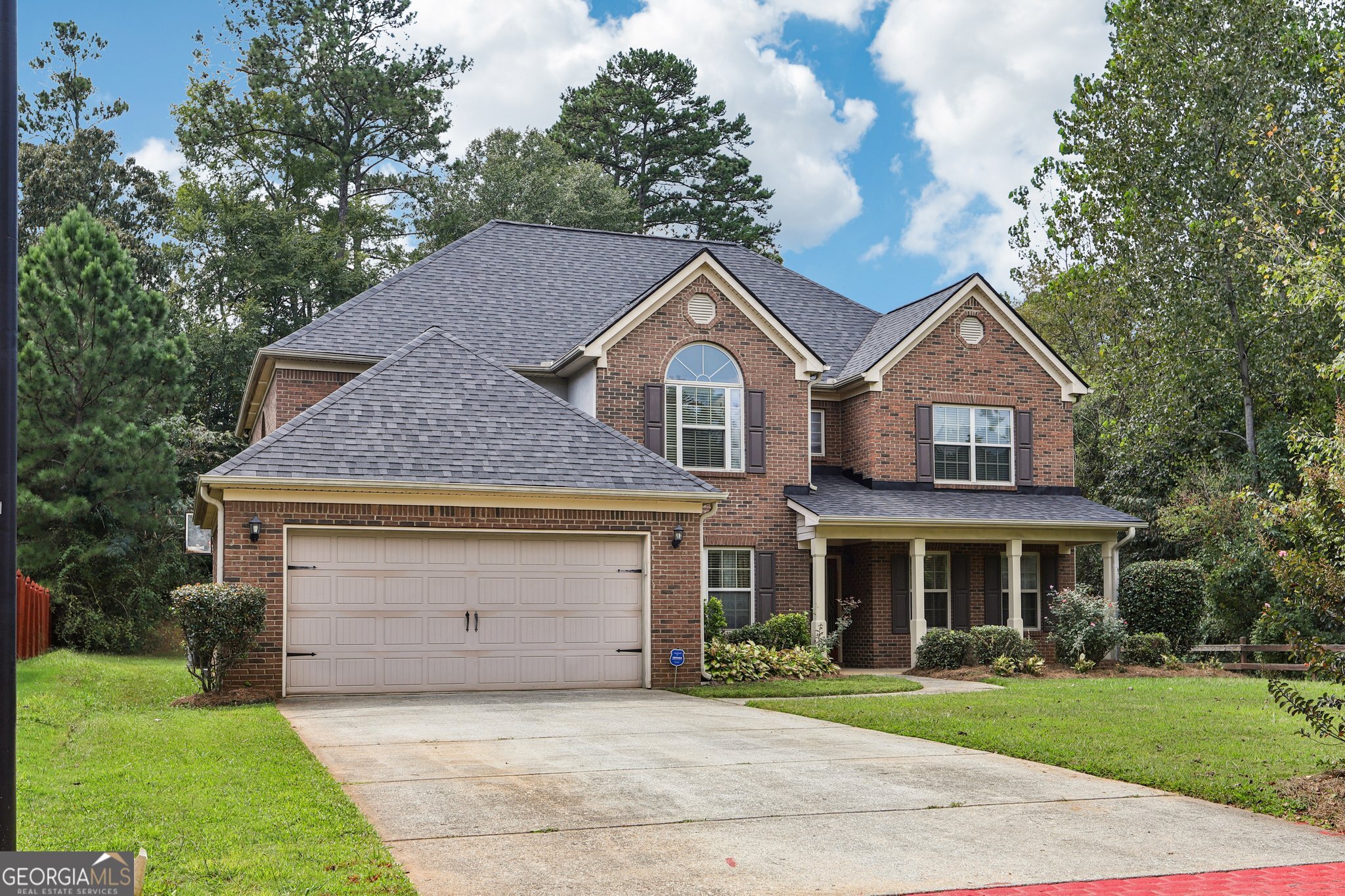 Beautifully updated 5BR/4.5BA home in Ellenwood! Fresh LVP flooring and paint throughout, newer roof and water heater. Main level features a large dining room, flex/office space, fireside living room, and kitchen with stained cabinets, island, walk-in pantry & new appliances. Full bedroom and bathroom suite on main. Upstairs find a spacious primary suite with sitting room and an ensuite bathroom with double vanity, soaking tub & separate shower, plus 3 secondary bedrooms (one with ensuite bath). Enjoy the flat backyard with covered patio-perfect for entertaining!