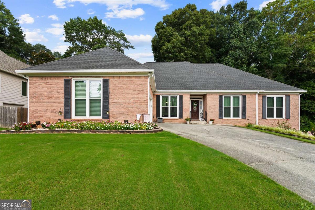 This beautifully renovated 4-5 bedroom, 3-bath residence offers over 4,000 sq. ft. of open, light-filled living space designed for today's lifestyle. From the moment you step inside, you'll notice the thoughtful updates and seamless flow that make this home perfect for both everyday living and entertaining. The open-concept floor plan creates a warm and inviting atmosphere, connecting living, dining, and kitchen spaces. A chef-inspired kitchen with modern finishes sets the stage for memorable gatherings. The primary suite features a luxurious zero-entry shower, combining style and accessibility. New windows and a newer roof give peace of mind with energy efficiency and long-term durability. Upstairs, generously sized bedrooms and updated baths provide comfort and privacy for the whole household. Outside, enjoy the expansive 0.63-acre lot with endless possibilities for recreation, gardening, or quiet relaxation. Tucked away on a peaceful cul-de-sac, the setting offers added privacy and safety. An optional HOA with swim and tennis amenities provides community perks without the mandatory fees. Located in a top-rated school district, this home is an ideal choice for those seeking both convenience and value. Just minutes from shopping, dining, and recreational amenities, you'll have everything you need at your fingertips. With its blend of space, upgrades, and unbeatable location, 2820 Ashton Tree Ct isn't just a house - it's the home you've been waiting for.