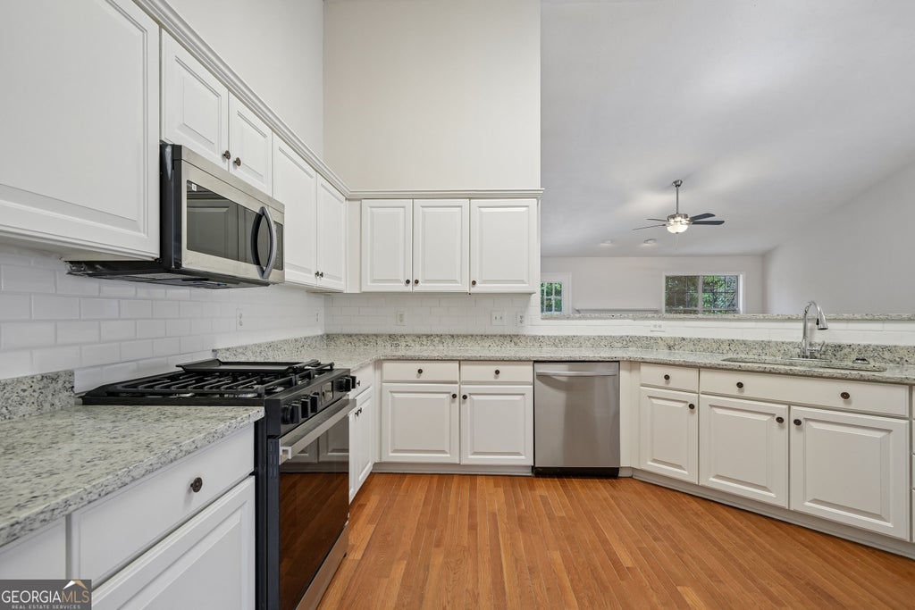 Photo of 3493 Dunbar Lane, Suwanee, GA 30024 (MLS # 10854094)