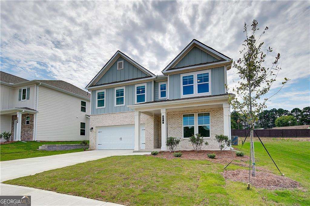 Photo of 279 Abbotts Crossing Circle, Conyers, GA 30094 (MLS # 10654989)