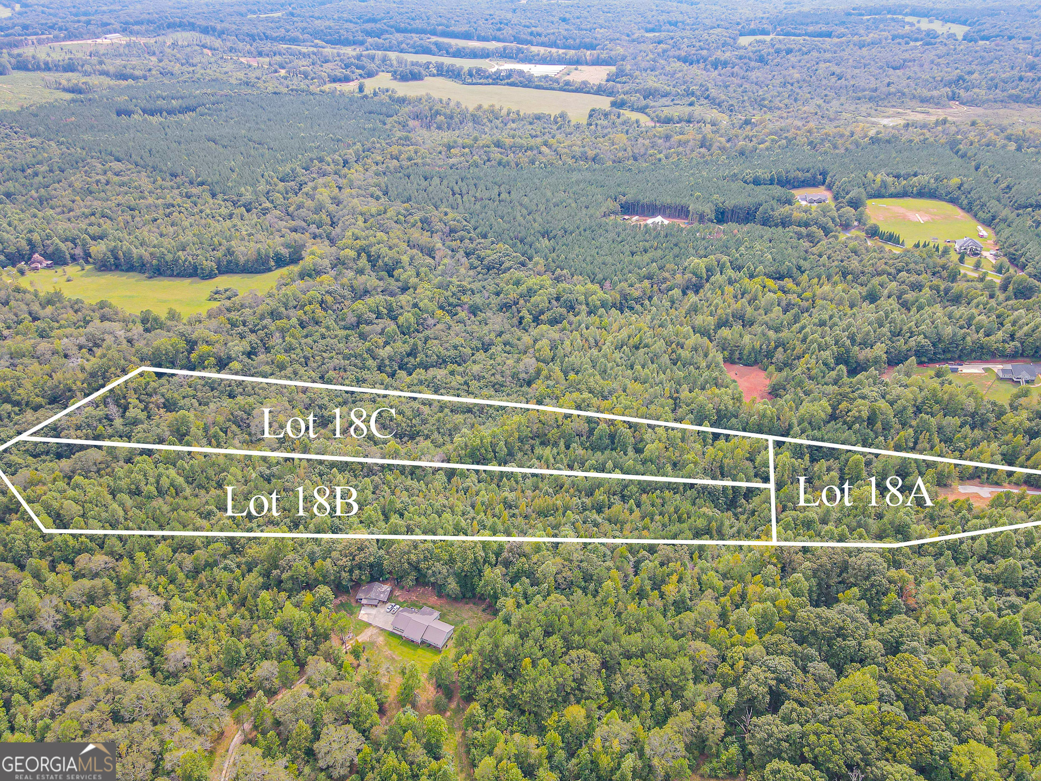 10.49 Acre Heavily Wooded Lot with River Frontage Discover the perfect blend of seclusion and natural beauty on this stunning 10.49-acre lot. Tucked away behind a private easement from Freedom Lane, this property boasts multiple potential home sites, each offering privacy and tranquility. The lot is heavily wooded, providing a peaceful retreat surrounded by nature. With over 150+ feet of frontage on the picturesque Grover River, enjoy the soothing sounds of the water and a wealth of wildlife right at your doorstep. Whether you're looking to build a dream home or a weekend getaway, this property offers endless possibilities for those seeking a serene escape in nature. Trusted Lender Homeowners Financial Group Casey Simmons.