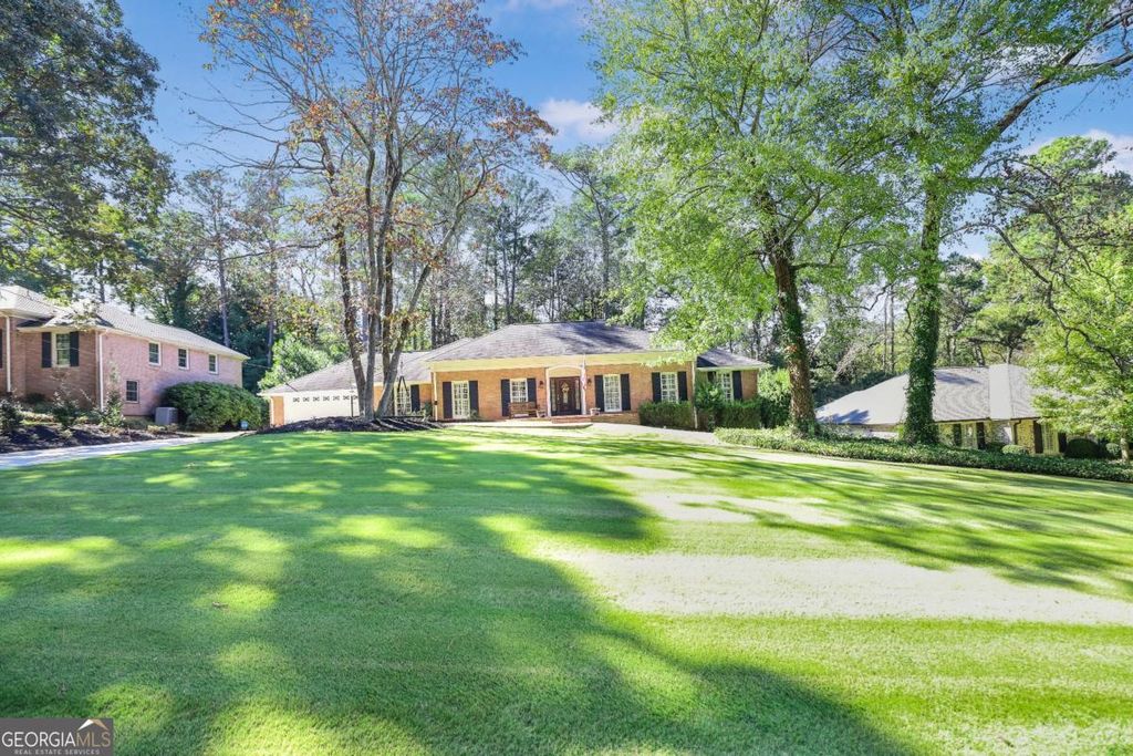 Photo of 5735 Riverwood Drive, Atlanta, GA 30328 (MLS # 10671218)