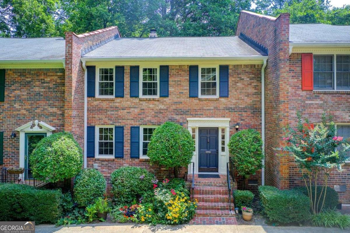 This beautiful 4BR, 2.5BA townhome sits on a prime lot in a quiet 18-home Decatur community. Thoughtfully updated and meticulously maintained, the home offers stylish finishes, flexible living, and true move-in readiness-zoned for top-ranked City of Decatur schools and walkable to Publix, the YMCA, dining, parks, and trails. Residents also enjoy a private community pool. Inside, you'll find the home in exceptional condition, with hardwood floors throughout, a chef-inspired kitchen featuring a large quartz island, stainless steel appliances, and soft-close cabinetry. The floorplan flows beautifully into the dining and living areas-perfect for entertaining or everyday living. Upstairs offers three generously sized bedrooms, two full bathrooms, and a dedicated office space-ideal for remote work, creative pursuits, or study. A main-level bedroom and half bath provide added flexibility for guests or multigenerational needs. Outside, enjoy your large private brick patio, or relax in the green space just steps from your front door. Don't miss this rare opportunity to own one of the most well-located and well-maintained homes in a highly sought-after Decatur community-schedule your showing today!
