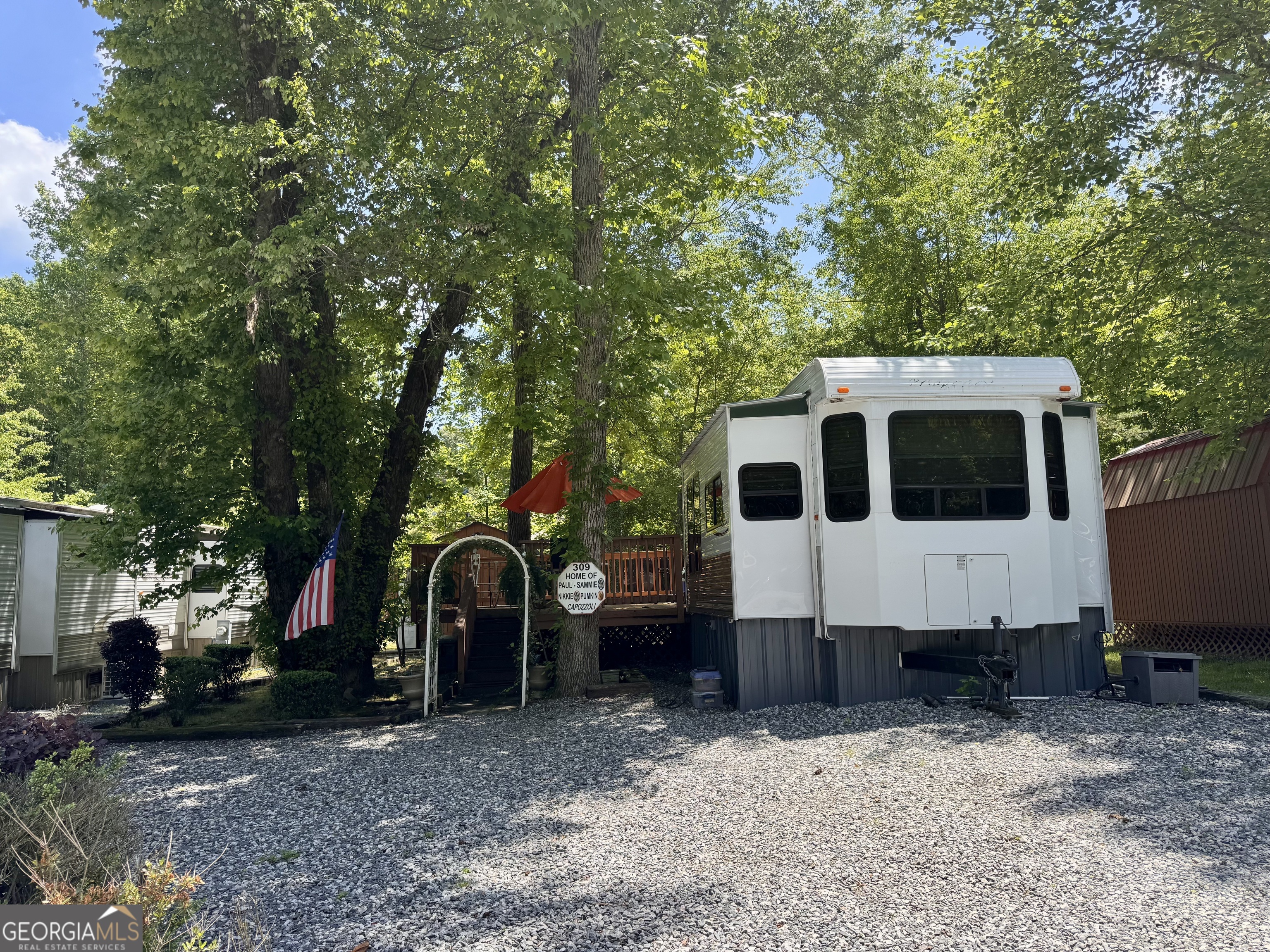 Nestled in the highly sought-after Leisure Acres Club, this charming 1-bedroom RV offers a cozy retreat with all the comforts of home. Perfectly situated within the community, it features a spacious, well-maintained deck-ideal for relaxing, entertaining, or simply enjoying the peaceful surroundings. Inside, is thoughtfully laid out with a comfortable living area, a functional kitchen, and a private bedroom, making it a perfect seasonal getaway or full-time residence. Don't miss this rare opportunity to own a slice of tranquility in one of the area's most desirable communities.