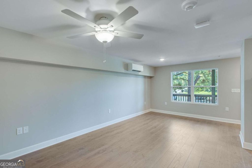 Photo of 710 Jesse Jewell Pkwy SE #216, Gainesville, GA 30501 (MLS # 10669776)