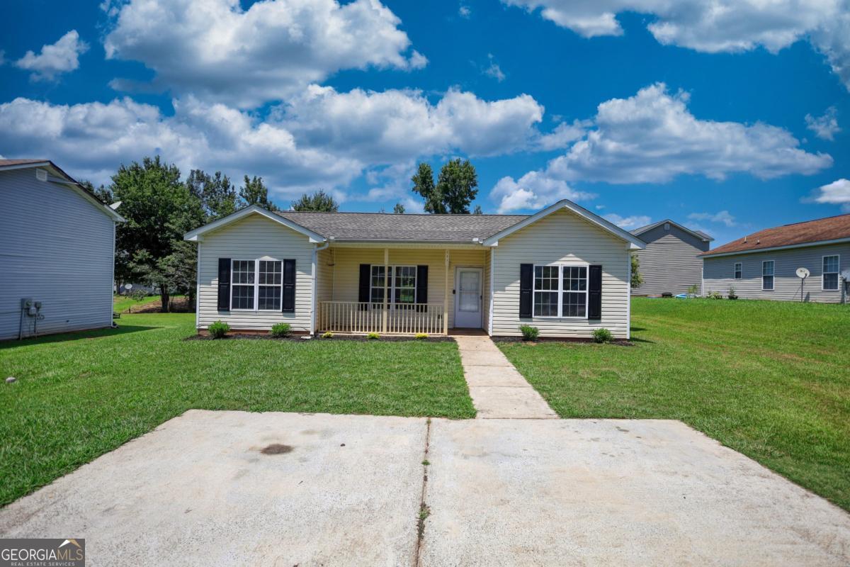 Remodeled step-less ranch in the desired Social Circle school district and close to downtown! Brand new roof, new Luxury vinyl plank flooring through out the home. Fresh paint. Open floor plan. Large master bedroom features walk-in closet and private master bathroom! Two spacious secondary bedrooms share another full bathroom! Adorable rocking chair front porch & rear patio. Private backyard. 100% USDA financing available! FHA eligible 9/11/25. Please call to schedule your private tour today! Shannon 770-833-2775