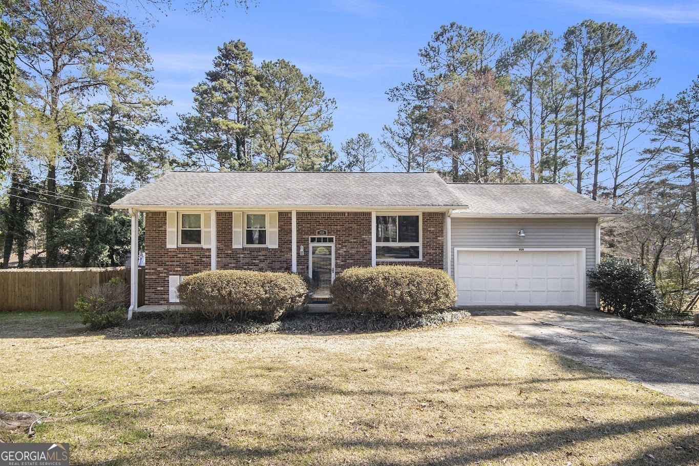 This inviting 3-bedroom, 2-bathroom split level home offers a comfortable and functional layout. The main level features a bright eat-in kitchen, a separate dining room, two generously sized bedrooms, and a full bathroom. On the lower level, you'll find the private primary bedroom complete with an ensuite bathroom, as well as a cozy family room and convenient laundry area. Enjoy the outdoors with a spacious patio, perfect for entertaining, and a newly installed wood fence providing privacy. Additional amenities include a two-car garage for your convenience. Don't miss out on this lovely home!