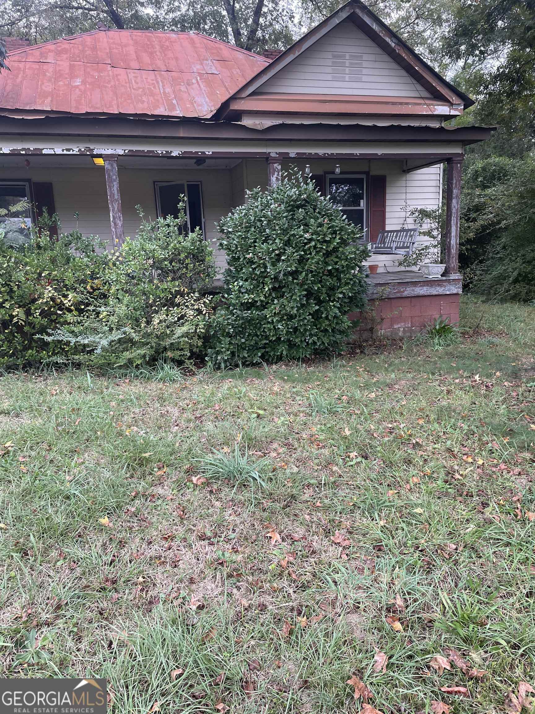2.35 Acres of beautiful land waiting for the right investor. This land is big enough to build two large homes. This home on this land is old and needs to be gutted, totally remodeled, or demolished. On this land, buyers will find a car shed, workshop, and a huge port that can be used to park an RV. Please send your best offer to burleyj2002@yahoo.com.