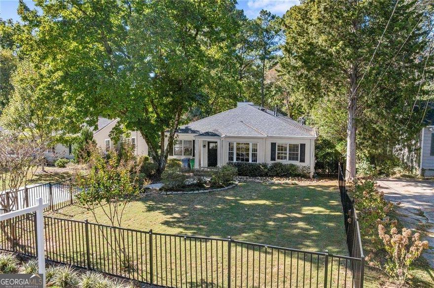 Welcome to this beautifully renovated and expanded two bedroom, two bathroom home in the highly sought-after Woodland Hills community! From the moment you arrive, you'll be charmed by the inviting curb appeal and fenced-in front yard. Inside, enjoy the ease of spacious, one-level living filled with natural light and gorgeous hardwood floors throughout. The updated kitchen features an island, stylish gray cabinetry, a gas range, and opens seamlessly to the large fireside living room addition and breakfast area-perfect for entertaining or everyday living. The primary suite is a true retreat with a walk-in closet, dedicated laundry room, and an oversized bathroom-a rare find in Woodland Hills! The secondary bathroom has been recently renovated with a stunning, oversized shower. Step outside to relax or entertain on the deck overlooking the expansive, fenced backyard-ideal for gatherings, grilling, or simply enjoying a quiet evening. Don't miss the large, stand-up crawlspace for all your storage needs. Enjoy easy access to the new CHOA location, Emory, CDC, VA Highland restaurants, Morningside Nature Preserve, Decatur, Buckhead, Brookhaven, Midtown, Downtown, 85/GA400 access, Starbucks, parks, restaurants, and MORE! Woodland Hills neighborhood provides excellent highway access and multiple options for commutes to almost any part of town. Experience the perfect blend of comfort, convenience, and charm!