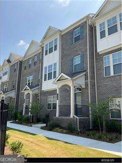 ***SPECIAL: ONE MONTH RENT CONCESSION*** Welcome to Greystone Townhomes where living space is abundant! Need a home office? This home has the perfect space!! Experience upscale living in our beautifully designed 3 bedroom townhome, with a spacious 2-car garage. At Greystone, we believe that luxury should be a part of everyday life. Our homes are thoughtfully crafted with premium features like: elegant quartz countertops and rich hardwood floors, stunning 9-foot tray ceilings create a sense of openness and sophistication. Upgrade your living experience with motion-sensor kitchen faucets and blue UV light bathroom lights. Beyond the beautiful interiors, you'll have access to a host of amenities designed for comfort and leisure. Relax by the community pool, challenge friends to a game of cornhole, or unwind in the peaceful courtyard. Our prime location on Peachtree Industrial Boulevard places you just minutes away from all the best that Gwinnett County has to offer, whether it's shopping, dining, or entertainment. At Greystone Townhomes, we make leasing a seamless experience. Our small, professional management team is dedicated to handling everything from lawn care to maintenance requests, so you can focus on what matters most. Plus, we're a pet-friendly community, so your furry friends are welcome too! Come discover the luxury of leasing at Greystone Townhomes and make us your new home. We're ready to welcome you as our newest resident!