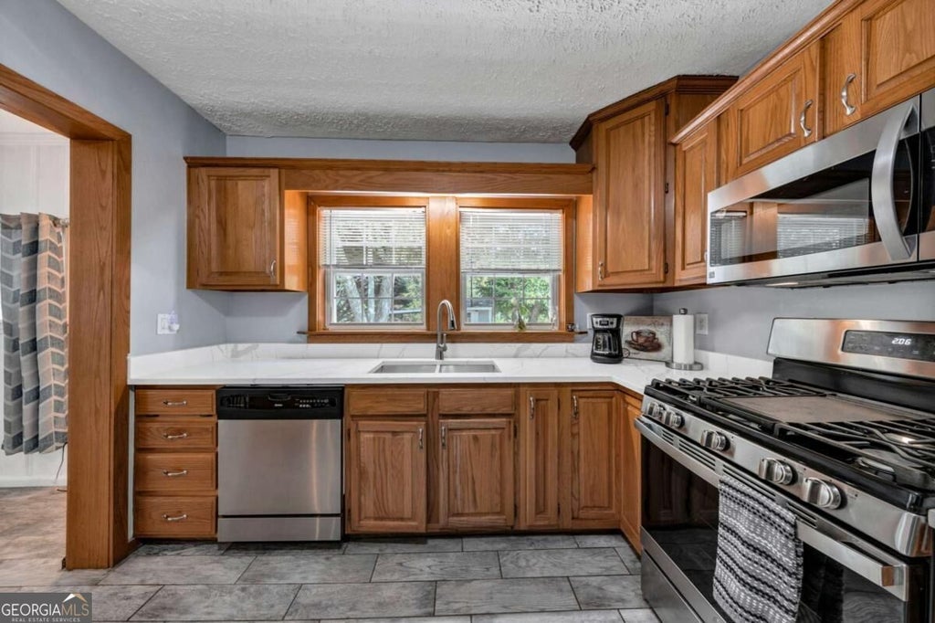 Photo of 1011 Rainey Road, Temple, GA 30179 (MLS # 10852503)