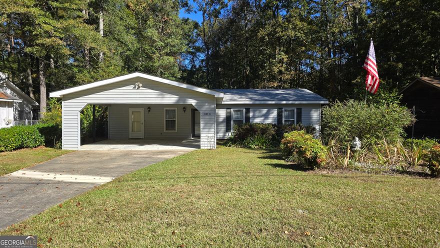 Built in 1977 and lovingly cared for by its original owners, this inviting 3-bedroom, 2-bath home offers space, comfort, and plenty of opportunity to make it your own. Step inside to an open family room that flows into the dining area, kitchen, and cozy breakfast nook-perfect for gatherings and everyday living. The kitchen features modern appliances, while the adjacent utility room includes a washer and dryer along with plenty of storage space. The spacious primary suite offers a walk-in closet and private bath, and the two additional bedrooms provide comfort and flexibility for family or guests. Out back, enjoy peaceful privacy with a screened-in deck, storage shed, and ample garden space for your landscaping dreams. A two-car carport adds extra convenience. While the home retains its original charm, it offers a wonderful opportunity to upgrade and modernize into your perfect dream home. With a little vision and personal touch, this well-loved property is ready to become your new home sweet home.