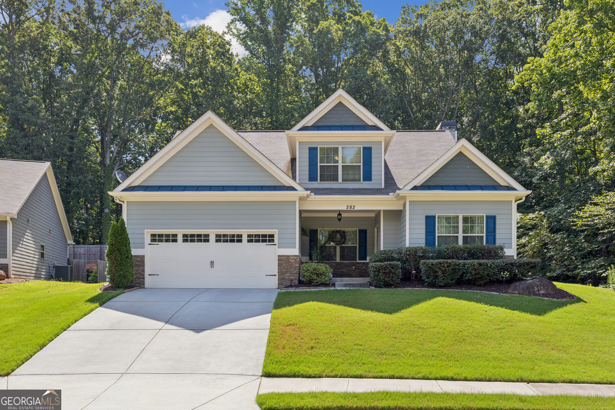 Welcome to 282 White Trillium Dr, Hoschton GA 30548--where comfort and convenience meet in this inviting single-family home. Boasting 3 spacious bedrooms and 2.5 pristine bathrooms, this property features an open layout designed for modern living. Enjoy the light-filled living areas, perfect for relaxing or entertaining, and a stylish kitchen that seamlessly flows into the dining space. Step into your patio retreat, ideal for outdoor dining, morning coffee, or unwinding after a long day. The primary suite is a true getaway, complete with his and hers closets and an en-suite bath for ultimate privacy. Perfectly situated just minutes from West Jackson Elementary School--rated highly for academic excellence--and the popular Mulberry Park, this home places you close to outdoor recreation, top-rated schools, and charming local dining options such as Hoschton Cafe, all within 2 miles. Don't miss your chance to own this exceptional home in a desirable neighborhood; schedule your private tour today and experience the best of Hoschton living!