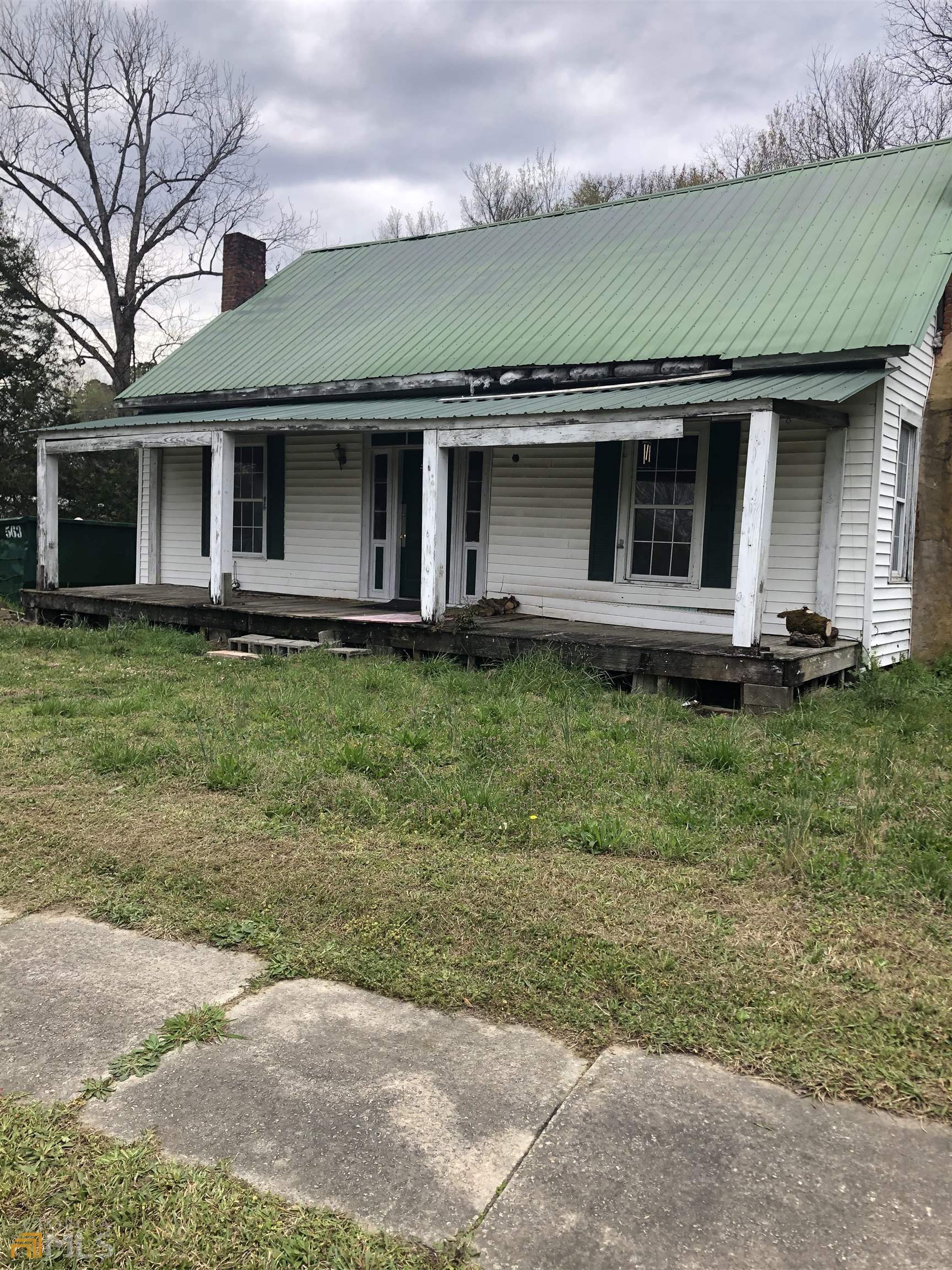 AS IS SALE , NO DISCLOSURE, ESTATE OWNED , INFORMATION NOT GUARANTEED. LEVEL CORNER LOT 90X355 FEET WITH TWO PAVED ROADS QUAINT AREA IN LONE OAK. FARMHOUSE BUILT IN 1910 AND IN NEED OF RENOVATION. ZONED CURRENTLY RESIDENTIAL BUT COULD BE GOOD COMMERCIAL LOCATION. SELLER NOT TO RE-ZONE. HOUSE HAS RECENTLY BEEN RENTED. GREAT LOCTION NEAR I-85, GA HWY 27 AND NEAR GREENVILLE, HOGANSVILLE. WARM SPRINGS AND LAGRANGE