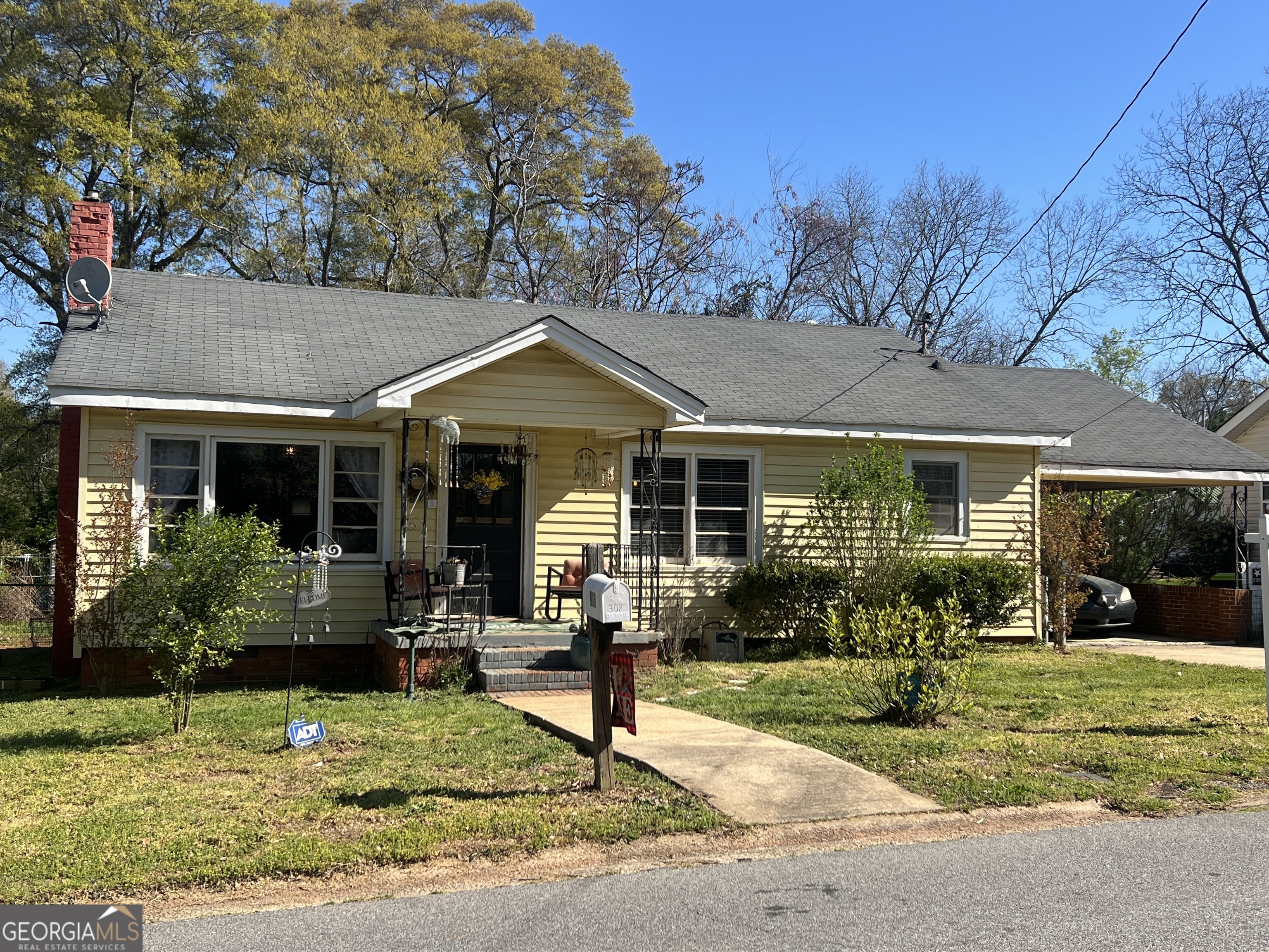 Adorable 3 bedroom 1 bath home located in the city! Living room, eat-in kitchen with appliances, separate dining room, and separate office or 3rd bedroom. Hardwood floors and some carpet. Roof and central heat and air are just a few years old. Front porch, covered back porch, side patio and single carport. Back yard is fenced.