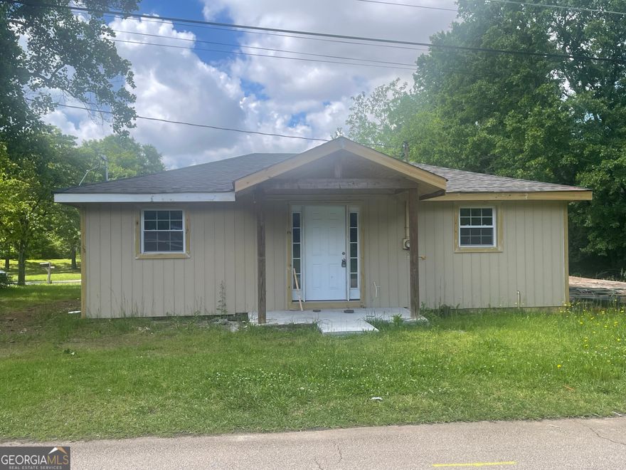 Distress property which has been partially remodeled with new roof, siding,  windows, and some electrical & plumbing completed. Bring your best offer!!