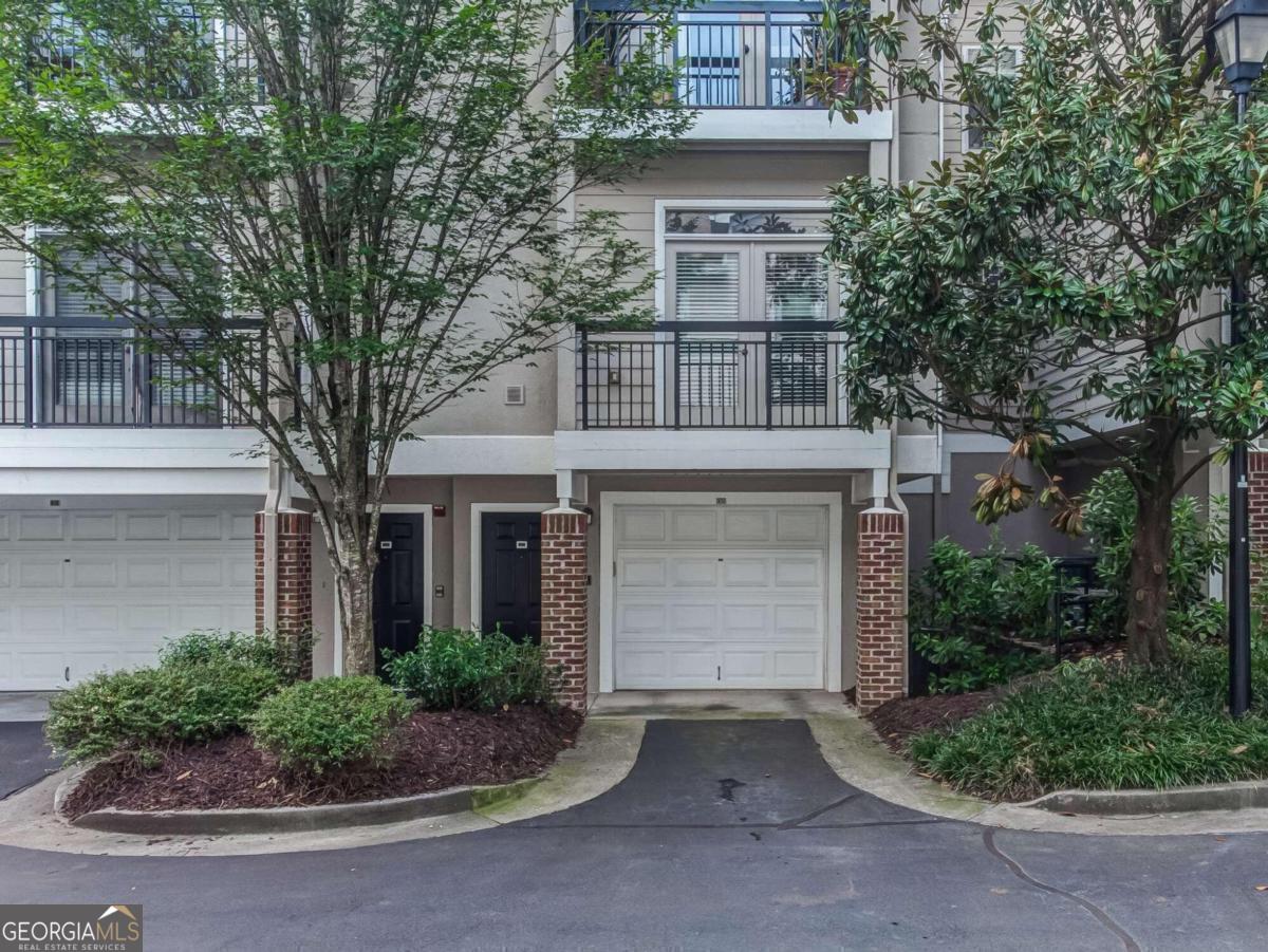 Luxury Gated Condo/Townhome in a Prime Atlanta Location! Discover modern living in this beautifully designed condo/townhome, nestled within a sought-after gated community just off Northside Drive. Ideally situated minutes from I-285, Buckhead, Vinings, and some of Atlanta's finest dining options. This home also offers access to excellent public and private schools, making it a perfect choice for families. Features You'll Love: Spacious & Open Layout: The open floor plan welcomes you with hardwood floors, a Juliette balcony, and a large-screen TV mount, creating a cozy yet contemporary living space. Stylish Kitchen: Enjoy wood cabinetry, granite countertops, stainless steel appliances, and pantry for ample storage. Bonus Space: A versatile area off the kitchen, currently set up as a home office, is spacious enough to double as a guest room with a futon or sleep sofa. Primary Suite Retreat: Relax in the generously sized bedroom featuring a walk-in closet and access to a beautiful full bath. Additional Highlights: Attached garage with extra storage and a convenient laundry area. Community Amenities: Two swimming pools, a fitness center, a grilling area, a dog park, a welcoming clubhouse, and a tranquil rock waterfall. Close to highways and public transportation, with premier shopping and dining just moments away. Important Notes: Leasing is permitted but subject to a waiting list. This home is truly move-in ready, offering a lifestyle of comfort, convenience, and modern charm. Schedule your appointment through showtime, property is seller occupied requires 24 hr notice. Buyer must be pre-qualified or provide source of funds with offer. Submit all offers on PDF to OneNationEntity@gmail.com Let's make this yours!