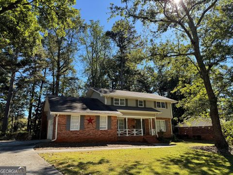 Photo of 5781 Four Winds Drive SW, Lilburn, GA 30047 (MLS # 10627659)