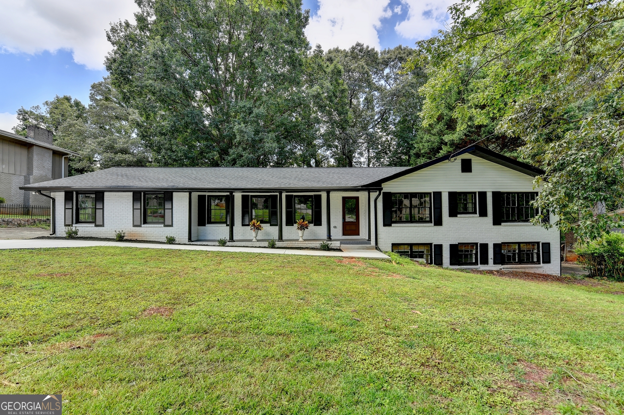 Located in the heart of Decatur, this stunning fully renovated ranch-style home offers the perfect balance of space, style, and comfort. Featuring 6 spacious bedrooms (4 on the main level and 2 in the basement) and 4 full bathrooms, this property is ideal for families looking to grow and enjoy every corner of their home. Step into an elegant open-concept layout, where the bright living area flows seamlessly into a modern kitchen equipped with updated cabinetry, premium finishes, and stainless steel appliances designed for everyday living and entertaining. The finished basement provides flexible space perfect for a media room, home office, gym, guest suite, or playroom. Love the outdoors? The private and spacious backyard is perfect for family gatherings, BBQs, or relaxing under mature trees.