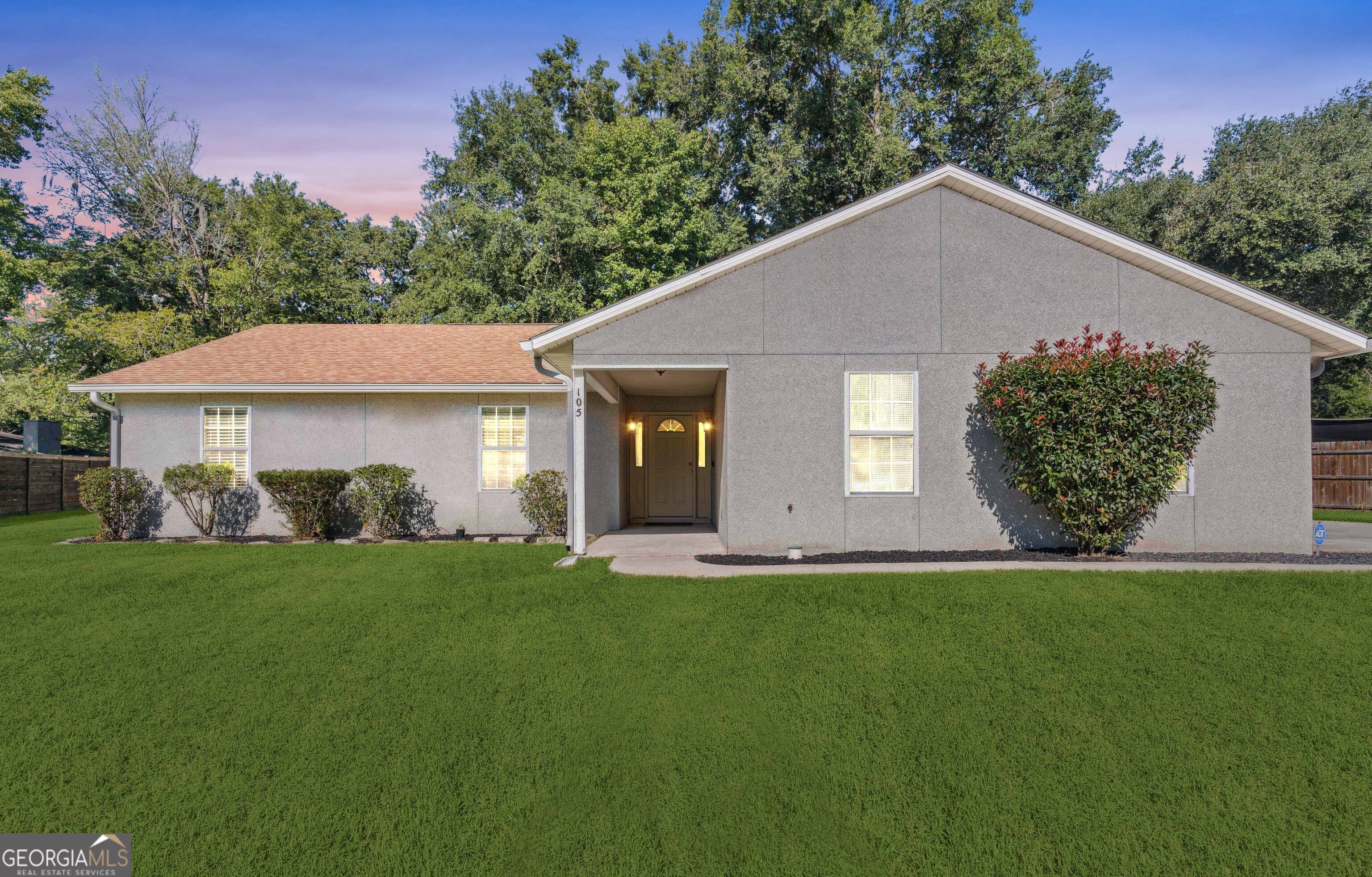 Beautifully Maintained Ranch-Style, tabby siding Home with No HOA & No Flood Insurance Required! This move-in ready 3-bedroom, 2-bath ranch offers the perfect blend of comfort, style, and freedom. The open-concept great room features a vaulted ceiling and flows into the main living areas with walnut-tone luxury vinyl plank flooring. New carpet adds warmth to all bedrooms. The kitchen includes a Whirlpool ceramic cooktop range, stainless steel Frigidaire French door refrigerator, and opens to a cozy dining space. A Samsung XL washer & dryer are also included. Enjoy the oversized 2-car garage with a custom screen for the garage and new insulated door, ideal for ventilation and versatility. The partially fenced backyard offers privacy for your family. Recent updates include a 6-year-old roof, gutter guards, and a 2019 AC unit. Best of all: No HOA, no flood insurance required, and just 15 minutes to Kings Bay Naval Base and minutes to the Florida state line/30 minutes to JAX international airport-perfect for commuters or military families. Don't miss this opportunity to own a well-cared-for home with updates, space, and location!
