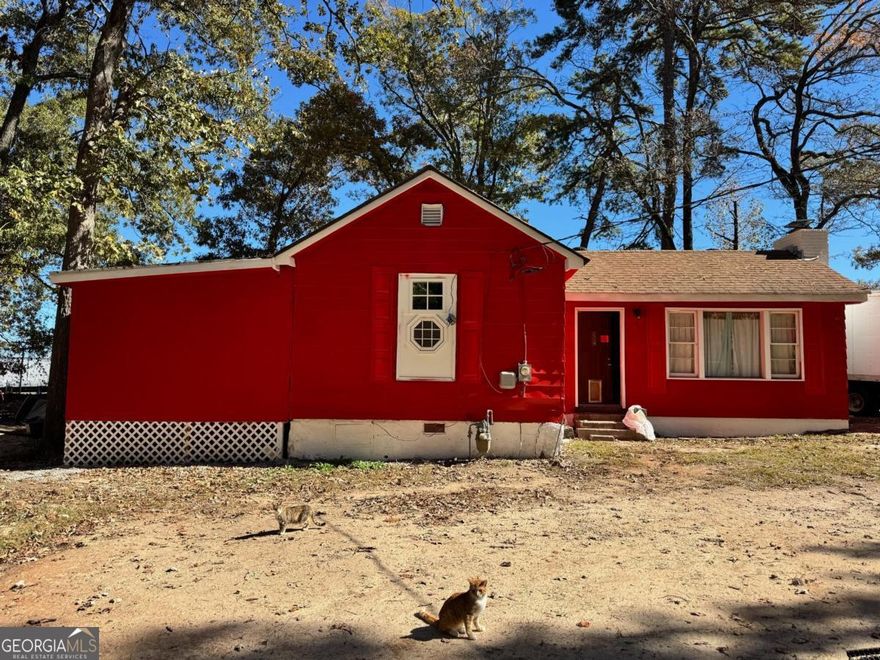 4 Bedroom, 1 Bathroom Home on Half an Acre in Morrow, Georgia.  Recent Square Footage Added and Renovations has been started. Level Lot and Fresh Exterior Paint, Sold As-Is with Cash Offers Preferred.  Last Property at the End of a Quiet Residential Street near Fort Gillem.  In Close Proximity to Downtown Forest Park.  Home is marked by Sign and Flier Box.