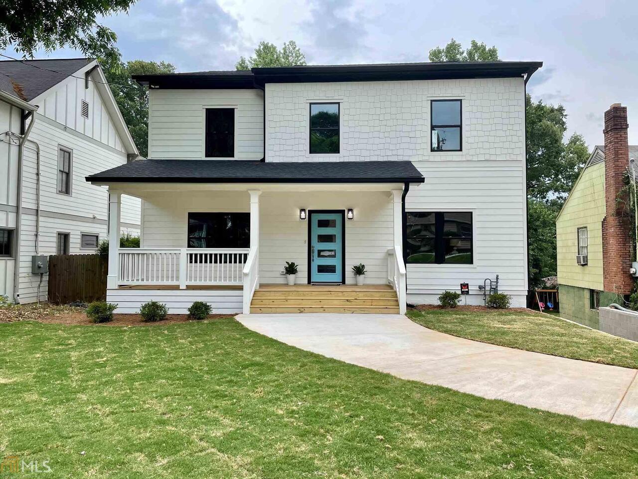 Like new construction with the much needed space in East Atlanta! This floor plan is an open kitchen open to the family room. Designer details will grab you in this home including custom upgrades, hardwoods throughout, a butler's pantry, walk in storage pantry, formal dining room with judges moulding, kitchen with high-end appliance package, and an owner's suite with fireplace, dual head shower, and customized walk-in closet. There are three working fireplaces in this home (all with shiplap cladding). Upstairs secondary bedrooms share a large jack-and-jill bath. Laundry conveniently located on upper level. Driveway leads around back to large parking pad with room for 4-6 cars. Back deck is 20x10 with entrance off the living room. Interior stairs down to cellar with good room for storage. Burgess Elementary and everything East Atlanta Village has to offer- coffee shop, restaurants galore, bike shop, farmer's market.