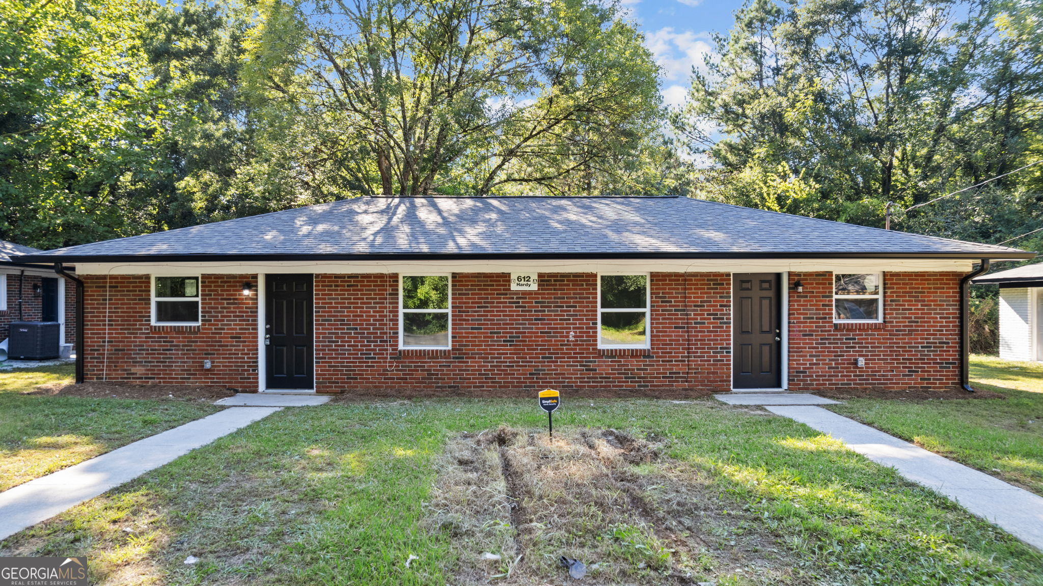 Recently Updated duplex in Rome, Georgia! Each unit offers 2 bedrooms and 1 bathroom, with updates that include a new roof, windows, flooring, plumbing, electrical, cabinets, countertops, bathroom fixtures, and modern appliances. This move-in ready property can be used for an owner-occupant or investor- live in one side and rent the other, OR lease both sides. Conveniently located, this turnkey duplex is a rare opportunity with lots of potential!