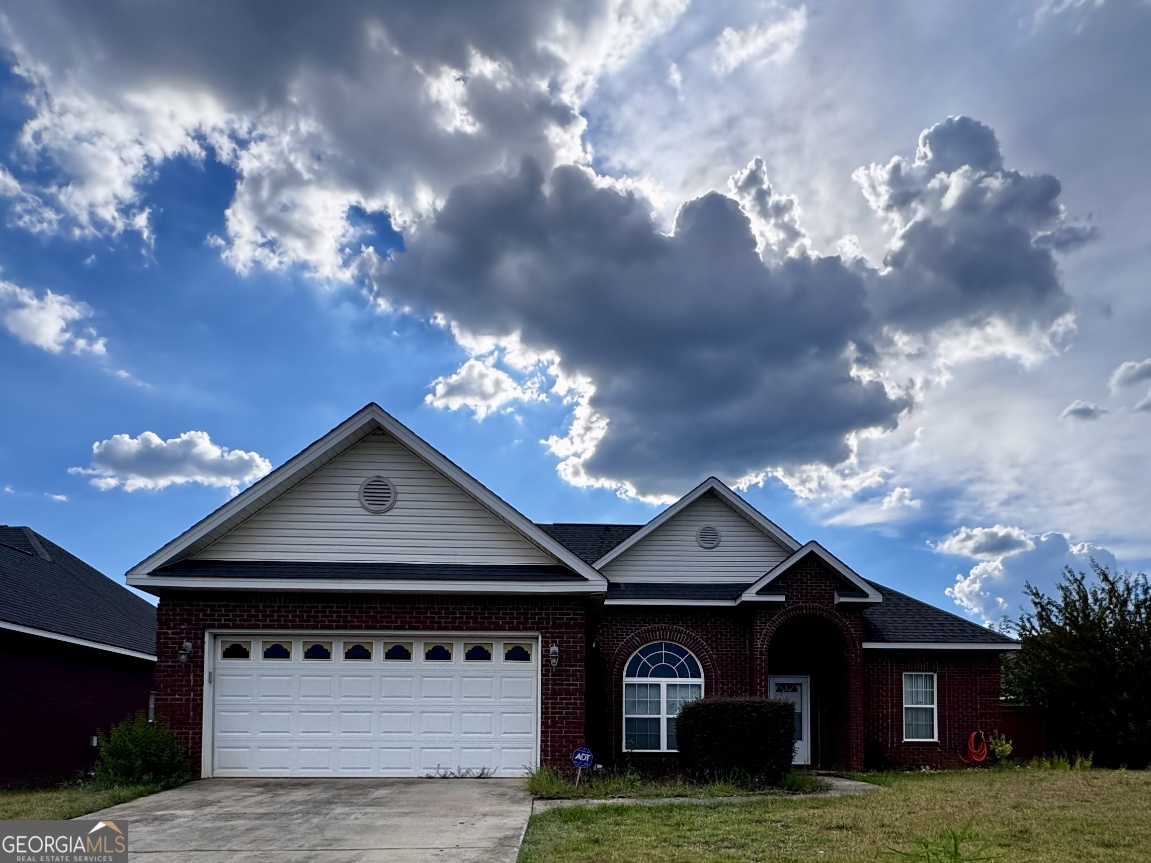 Nice and Open! This 4-sided brick home, located in Peach County Schools District is just what you have been looking for! Featuring 3 Bedrooms, 2 Bathrooms, Hardwood Floors, Black Appliances, Crown Molding, Solid Surface Counter Tops, Large Owners Suite, with a Garden Tub, Separate Shower, and a Large Walk-In Closet. A level backyard with a nice screened-in porch for you to Relax and Unwind! Come take a look at this beautiful property!